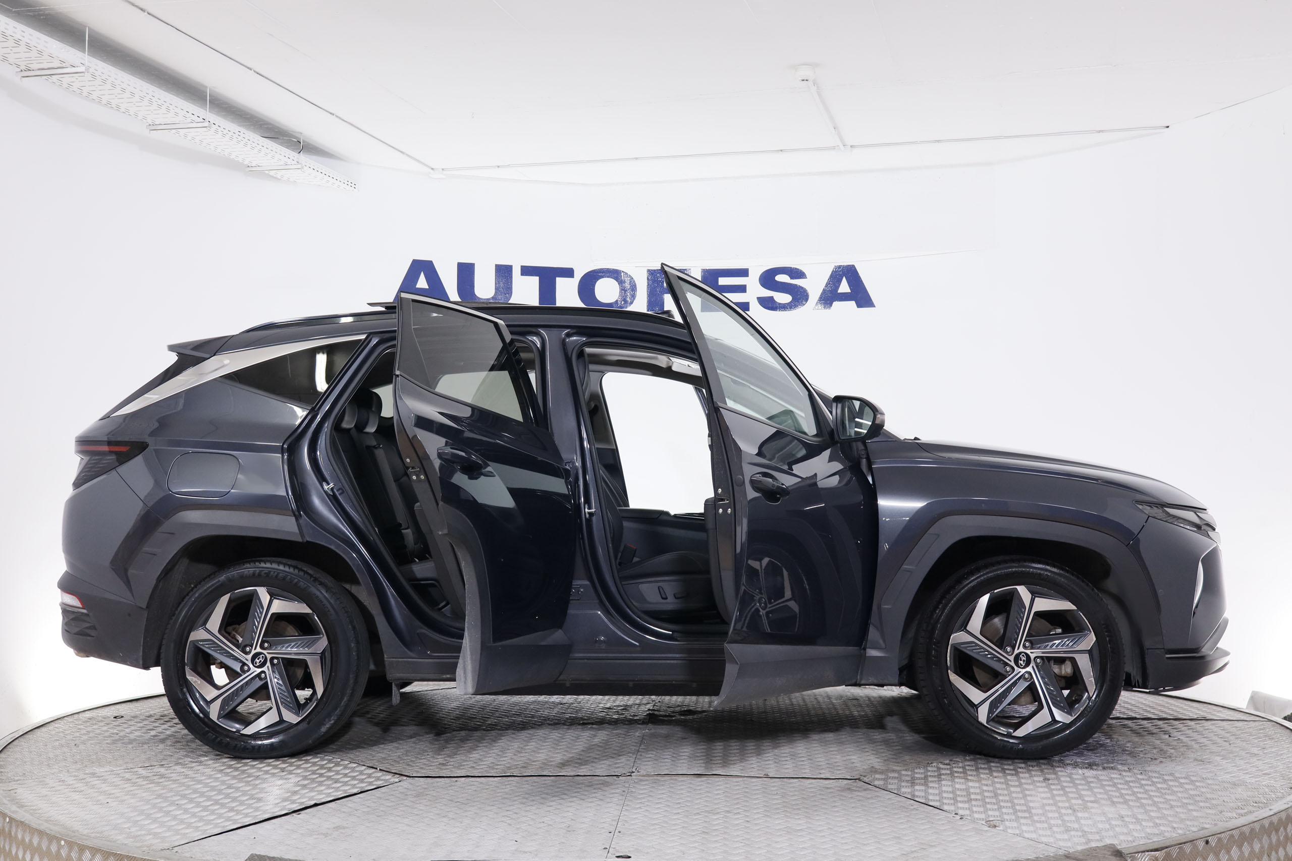 Hyundai Tucson 1.6 PHEV 4WD AUTO STYLE SKY 265CV 5P # IVA DEDUCIBLE,TECHO PANORAMICO ELE,NAVY foto 13