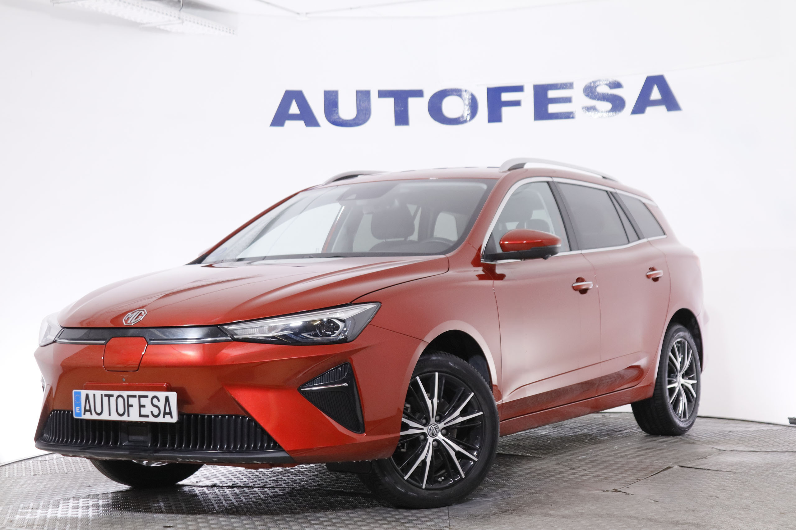 Mg MG5 ELECTRICO 61 KWH RANGE LUXURY AUTO 177CV 5P # CUERO, NAVY, PARKTRONIC foto 1